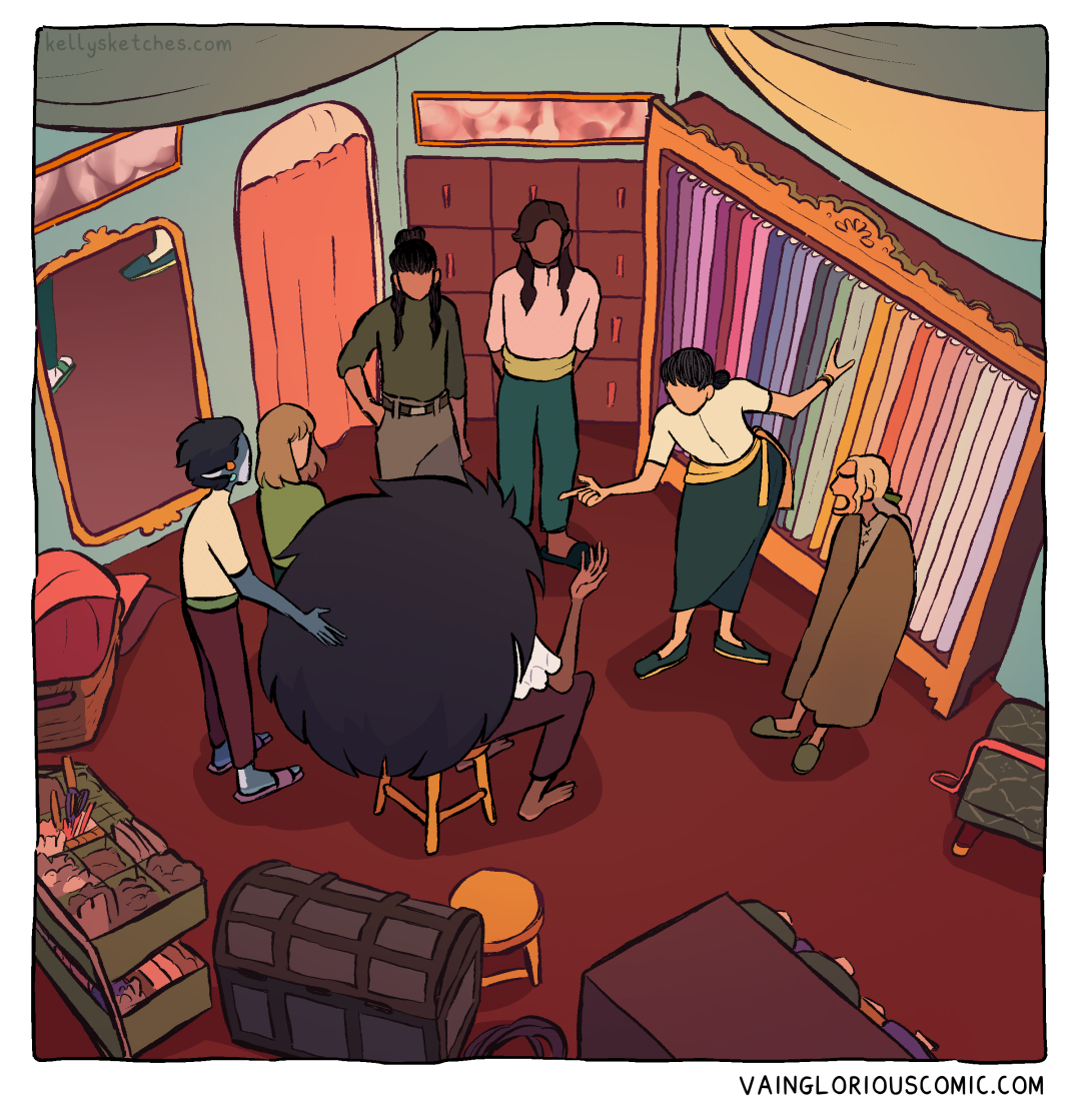 Crop of panel 5 without text. It's a shot of Carla's workroom. She has her hands in a wardrobe with multi-coloured cloths. 